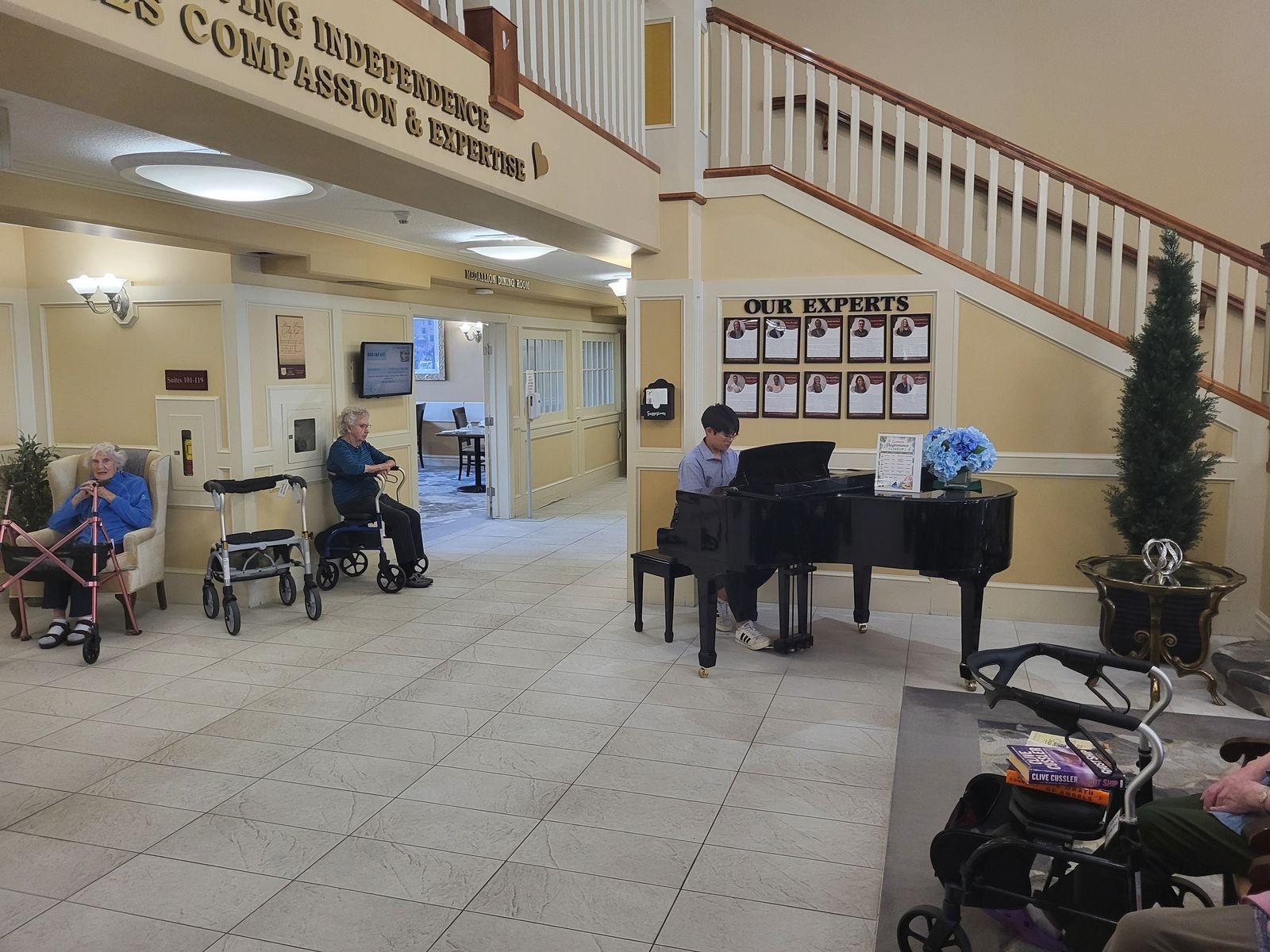 Student pianists performing at a Calgary senior home