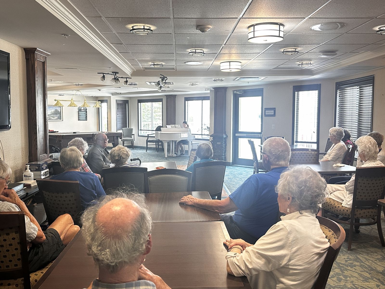 Residents gathering for a performance